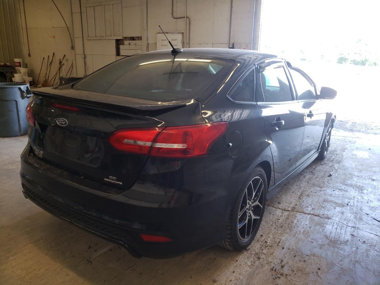 Photo 16 from auction – 2016 FORD FOCUS SE with VIN 1FADP3F23GL335212