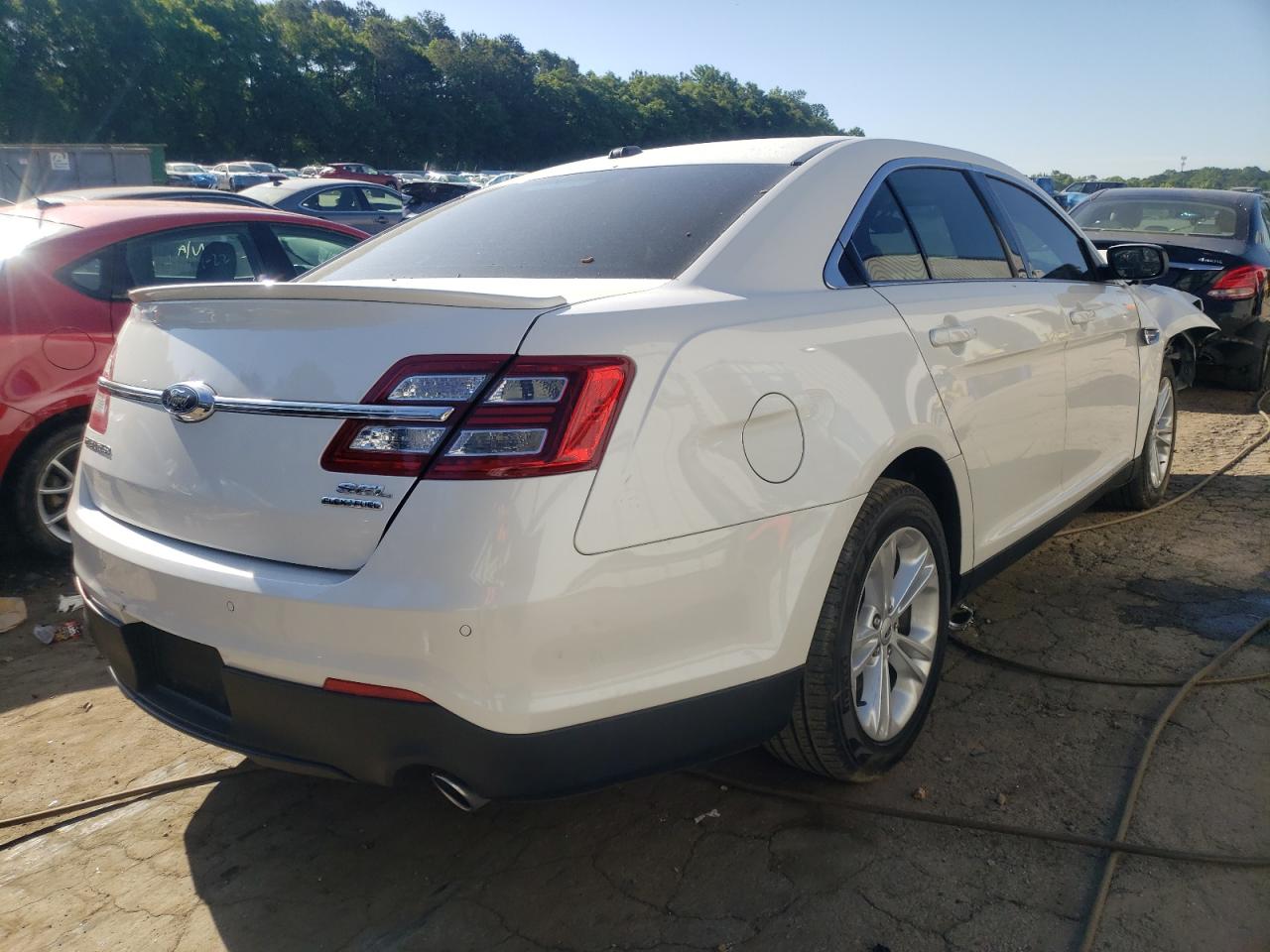 Photo 4 from auction – 2014 FORD TAURUS SEL with VIN 1FAHP2E87EG144772