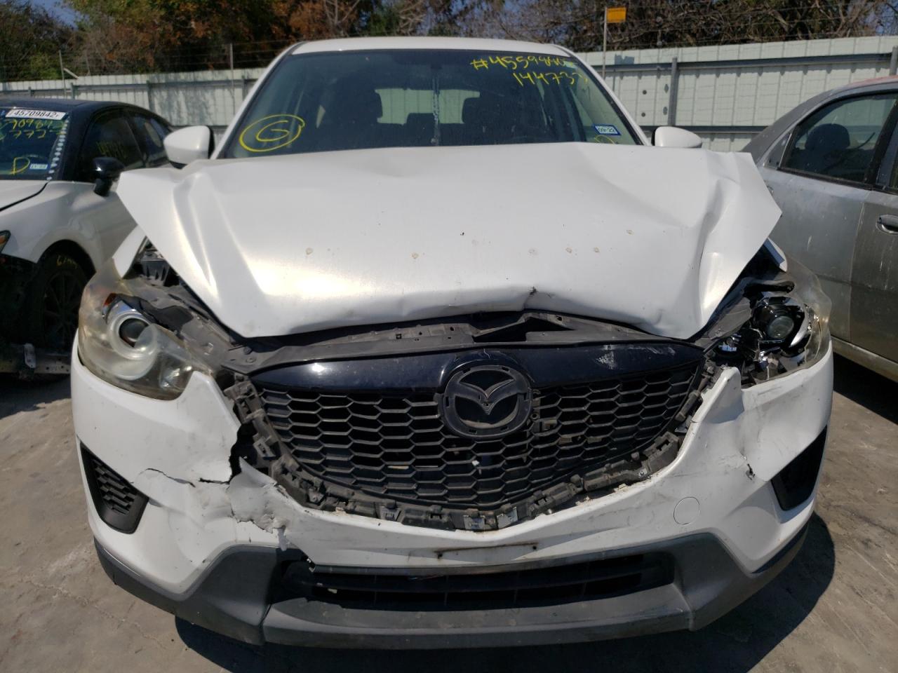 Photo 9 from auction – 2013 MAZDA CX-5 SPORT with VIN JM3KE2BEXD0144733