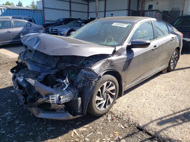 Photo 2 from auction – 2017 HONDA CIVIC EX with VIN 2HGFC2F74HH524911