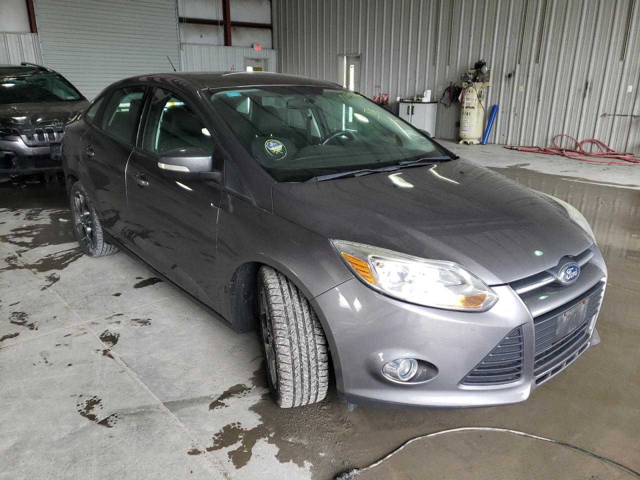 FORD FOCUS SE 2013 with VIN 1FADP3F21DL348679 - Photo from auction