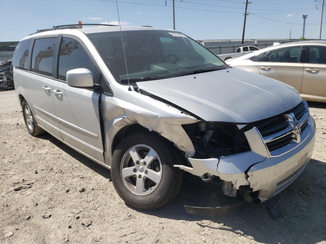 DODGE GRAND CARA 2010 with VIN 2D4RN5D15AR288486 - Photo from auction