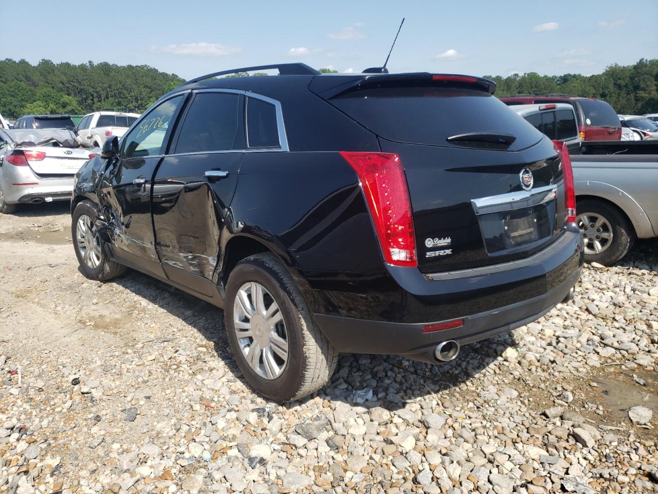 Photo 3 from auction – 2015 CADILLAC SRX with VIN 3GYFNAE34FS584242