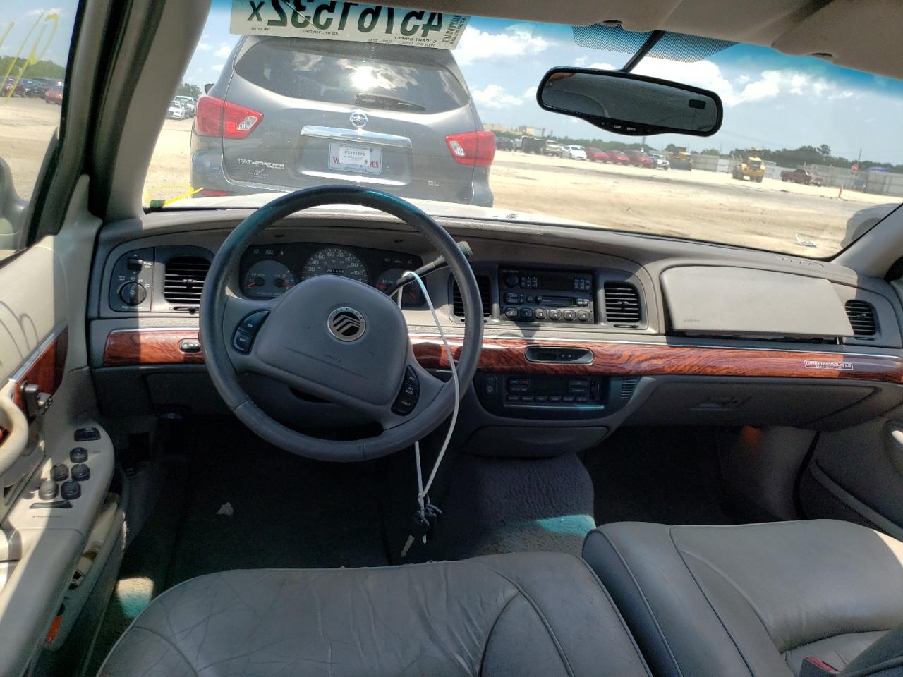 Photo 9 from auction – 2002 MERCURY GRAND MARQ with VIN 2MEFM75W32X651355