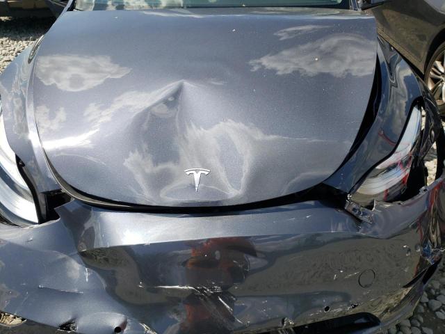 Photo 7 from auction – 2022 TESLA MODEL Y with VIN 7SAYGAEE0NF308564