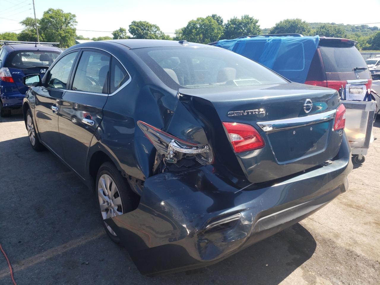 Photo 3 from auction – 2016 NISSAN SENTRA S with VIN 3N1AB7AP5GY215850