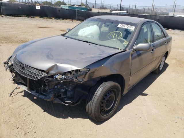 Photo 2 from auction – 2004 TOYOTA CAMRY LE with VIN JTDBE32K040281118
