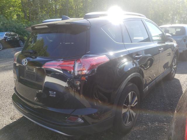 Photo 4 from auction – 2016 TOYOTA RAV4 XLE with VIN 2T3RFREV1GW438711