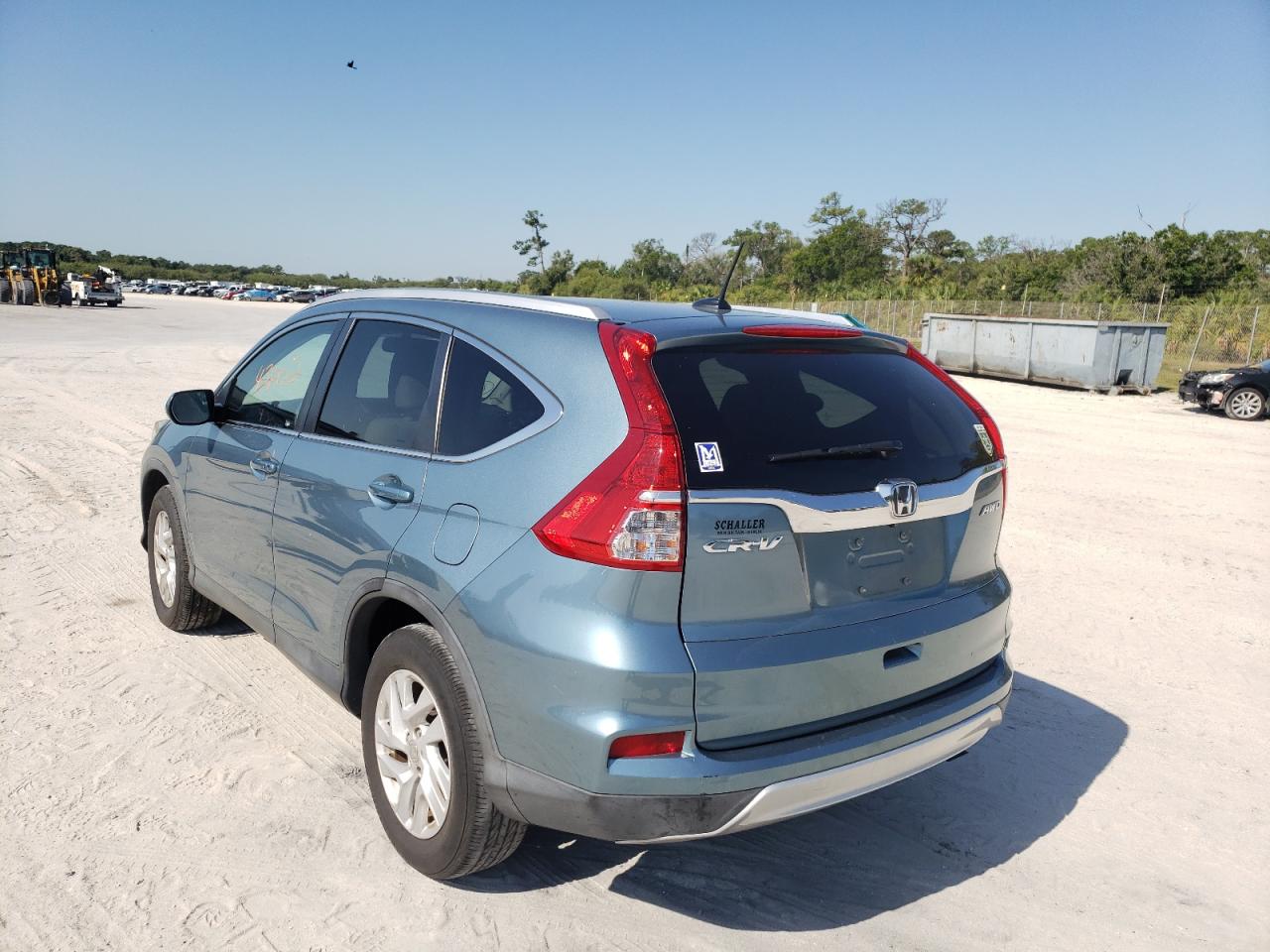 Photo 15 from auction – 2016 HONDA CR-V EXL with VIN 2HKRM4H79GH667621