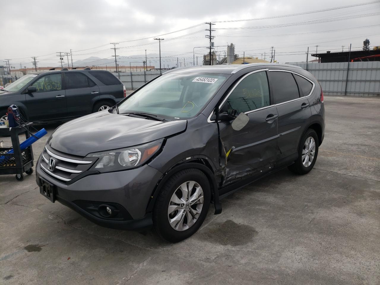 Photo 2 from auction – 2014 HONDA CR-V EXL with VIN 2HKRM3H77EH540437