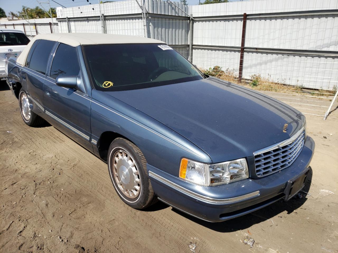 CADILLAC DEVILLE 1999 with VIN 1G6KD54Y1XU770028 - Photo from auction