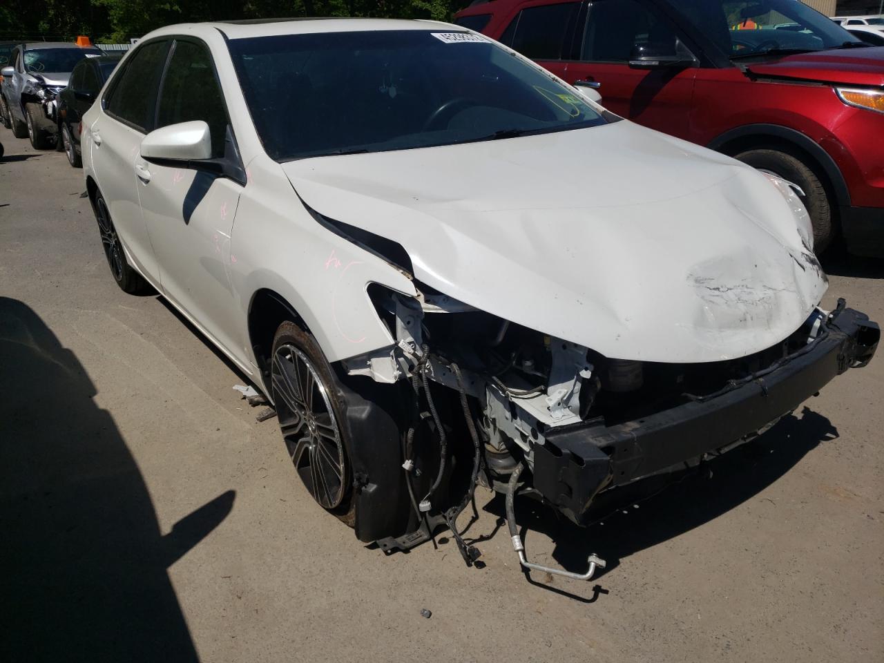 TOYOTA CAMRY LE 2016 with VIN 4T1BF1FK0GU180293 - Photo from auction