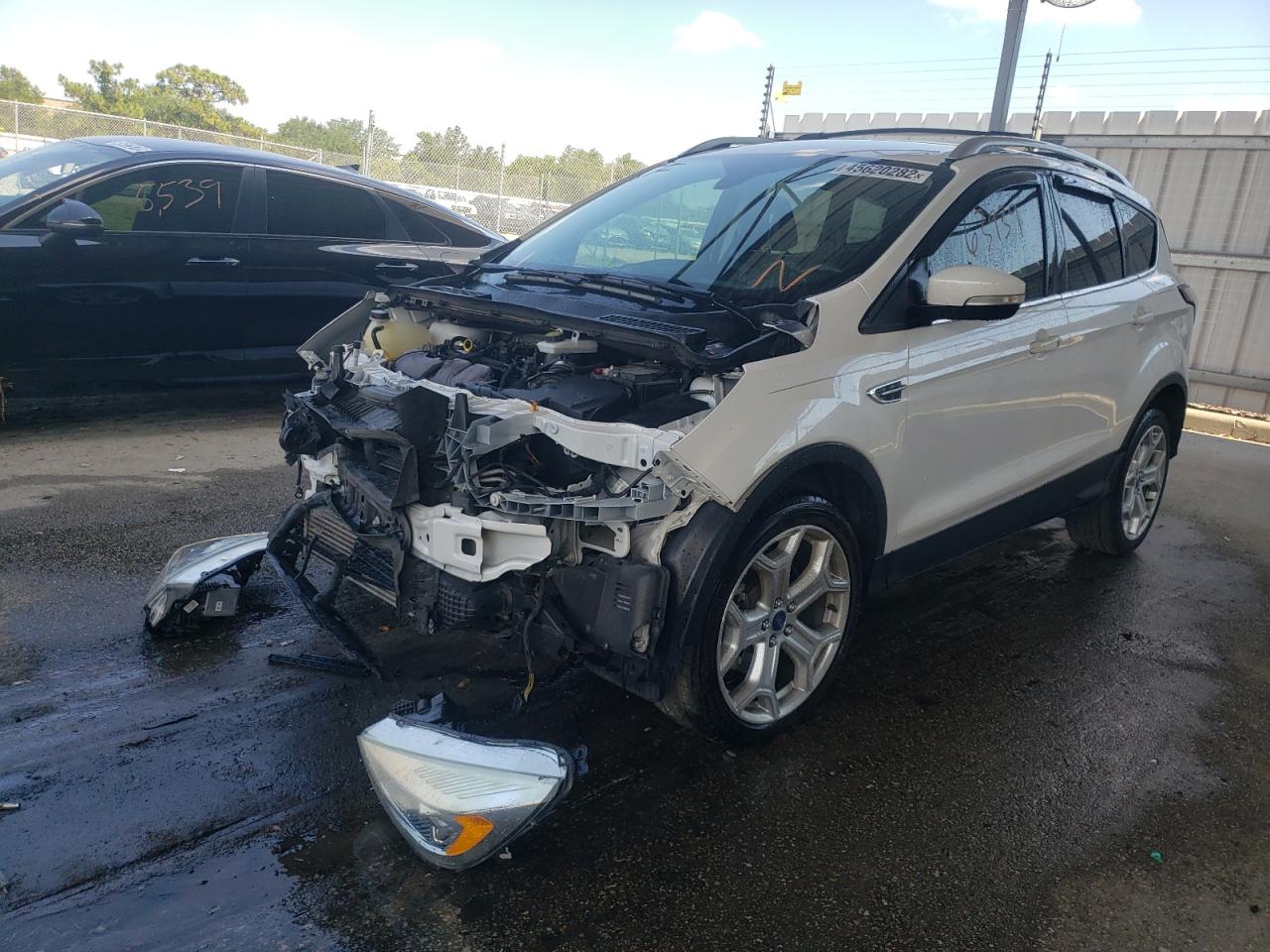 Photo 2 from auction – 2017 FORD ESCAPE TIT with VIN 1FMCU0J96HUE86764