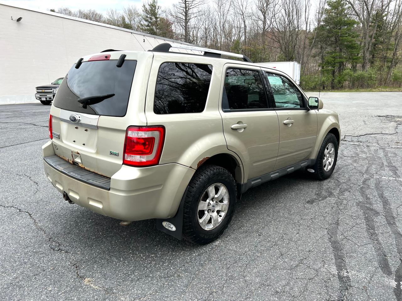 Photo 4 from auction – 2010 FORD ESCAPE LIM with VIN 1FMCU9EG8AKB07875