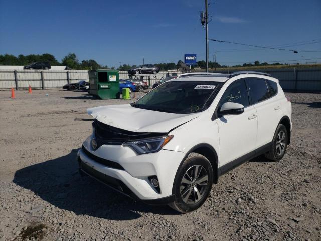 Photo 2 from auction – 2017 TOYOTA RAV4 XLE with VIN JTMRFREV6HJ106764