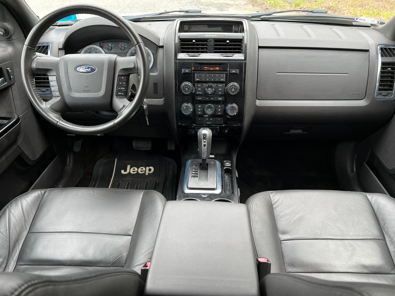 Photo 9 from auction – 2010 FORD ESCAPE LIM with VIN 1FMCU9EG8AKB07875