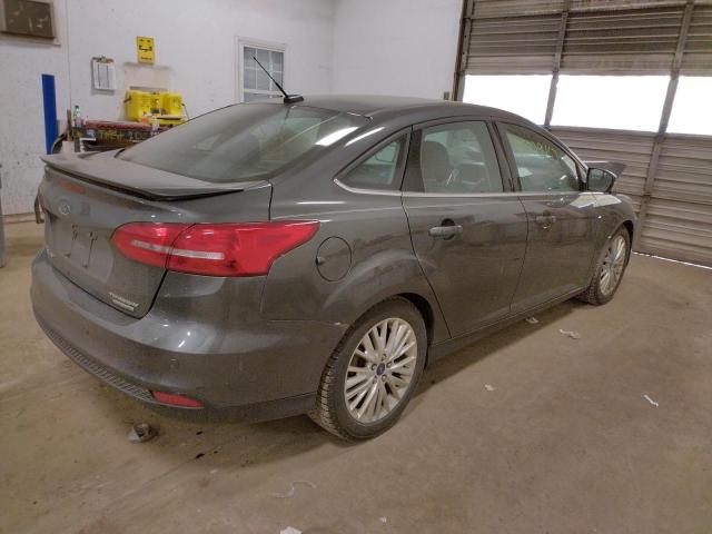 Photo 4 from auction – 2015 FORD FOCUS TITA with VIN 1FADP3J20FL293152