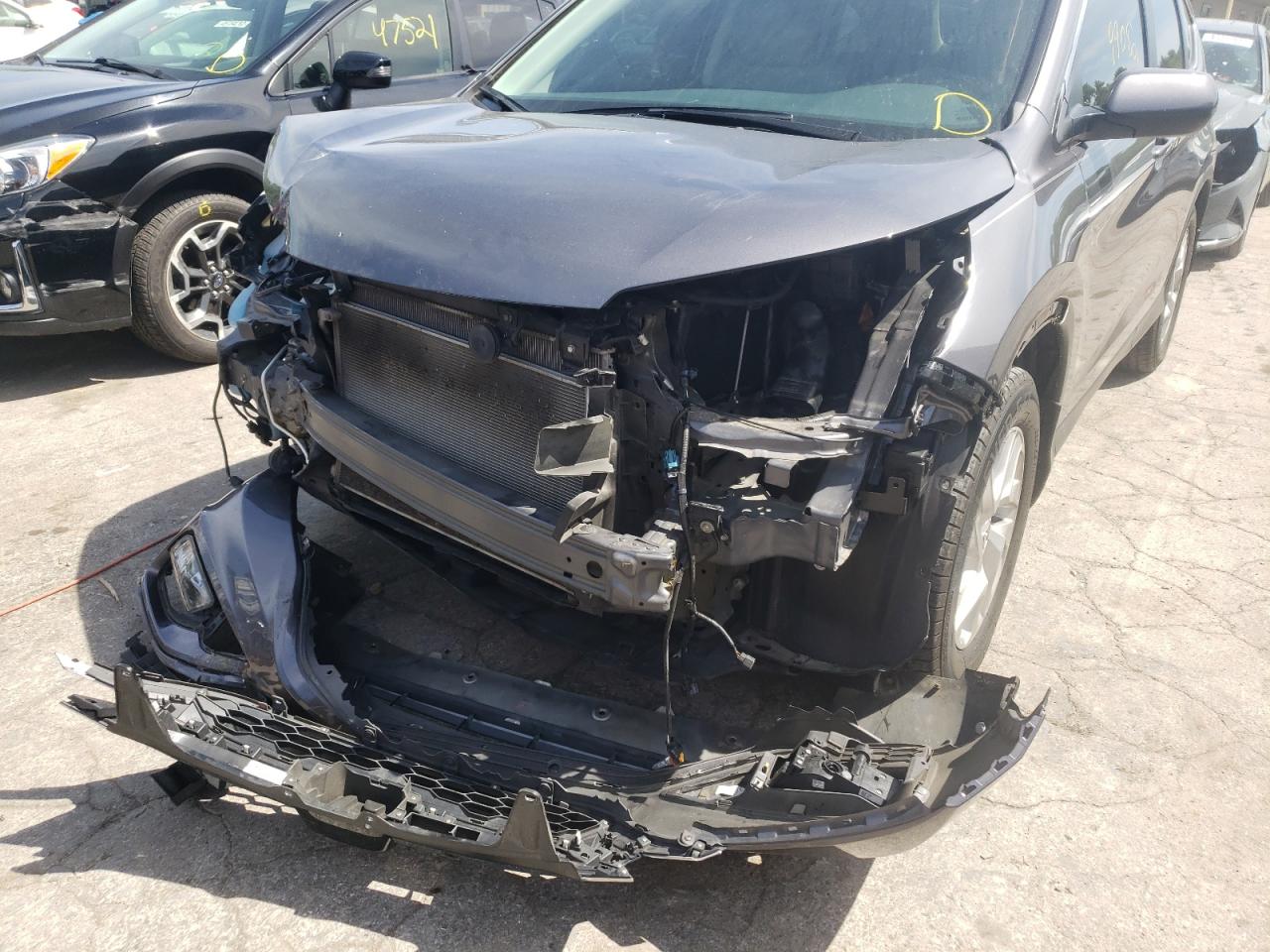 Photo 20 from auction – 2016 HONDA CR-V EXL with VIN 2HKRM3H79GH568047