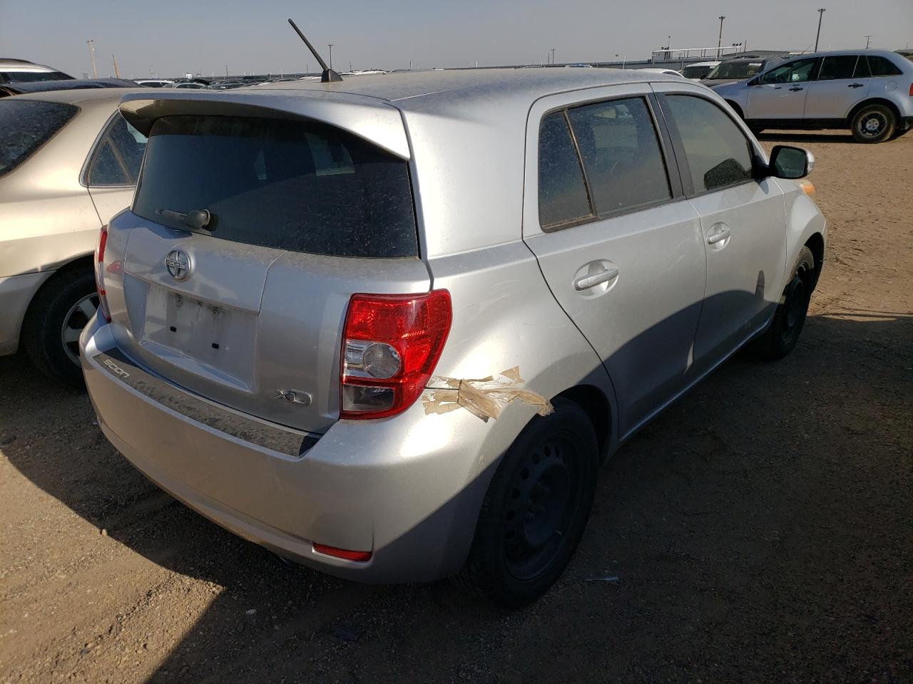 Photo 19 from auction – 2011 TOYOTA SCION XD with VIN JTKKU4B40B1012563
