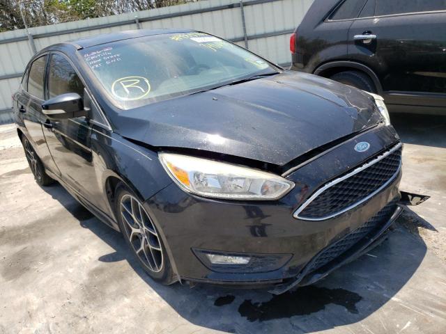 FORD FOCUS SE 2015 with VIN 1FADP3F20FL348045 - Photo from auction