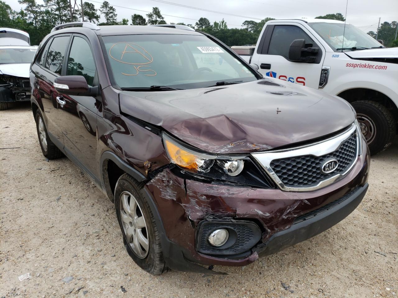 KIA SORENTO 2013 with VIN 5XYKT3A60DG391350 - Photo from auction