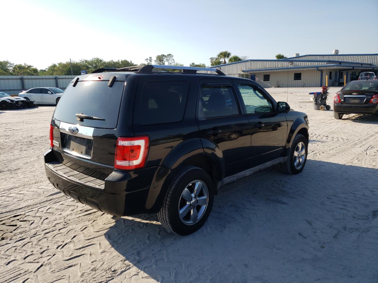 Photo 4 from auction – 2009 FORD ESCAPE LIM with VIN 1FMCU04739KB28707