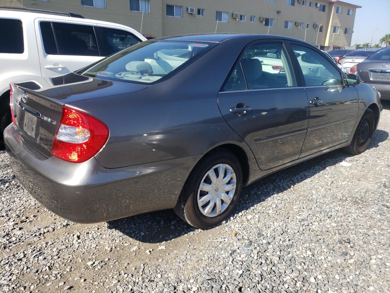 Photo 4 from auction – 2002 TOYOTA CAMRY with VIN JTDBE32K120117082