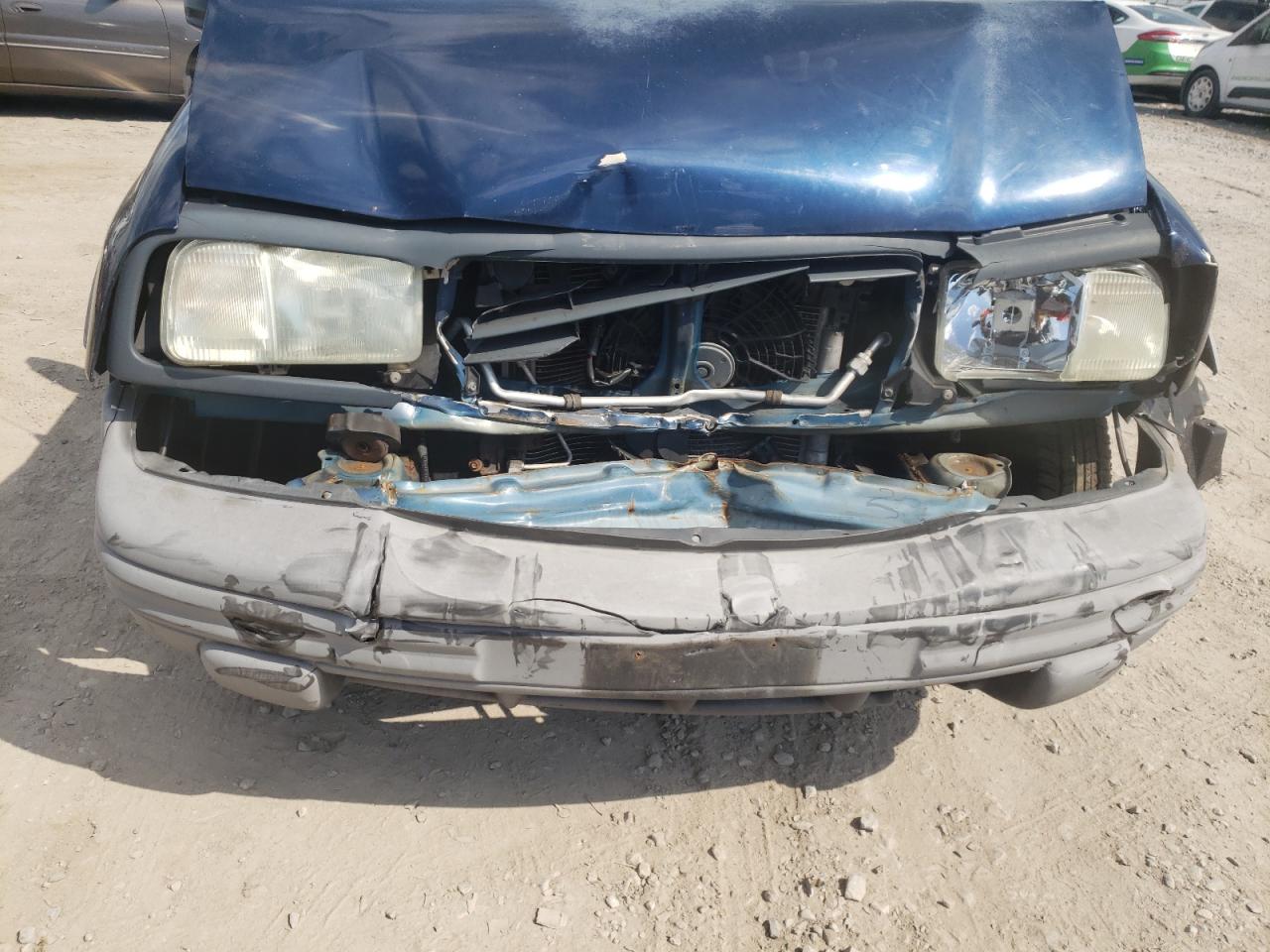 Photo 9 from auction – 2004 CHEVROLET TRACKER ZR with VIN 2CNBJ734046910737