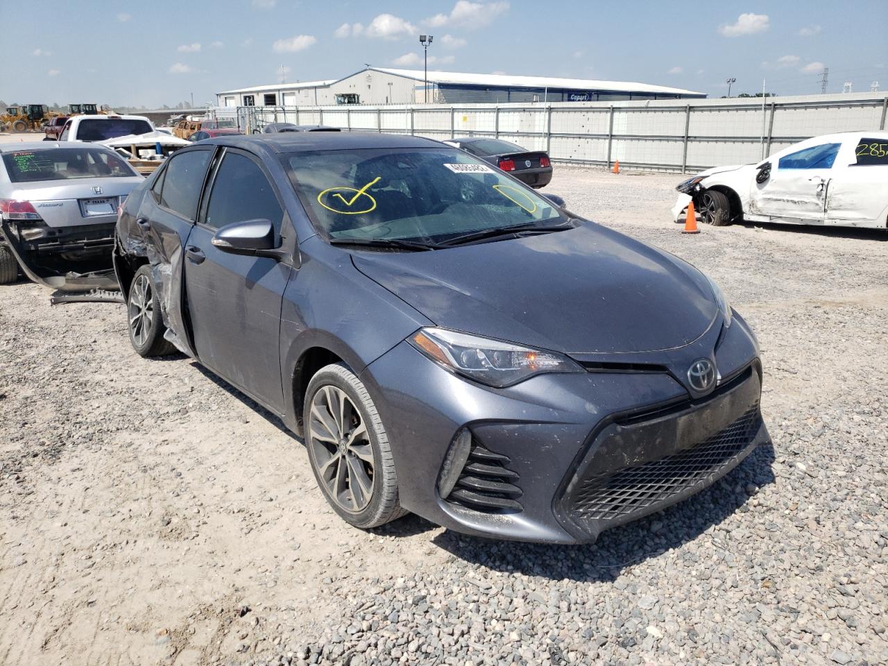 TOYOTA COROLLA L 2017 with VIN 5YFBURHE1HP652970 - Photo from auction
