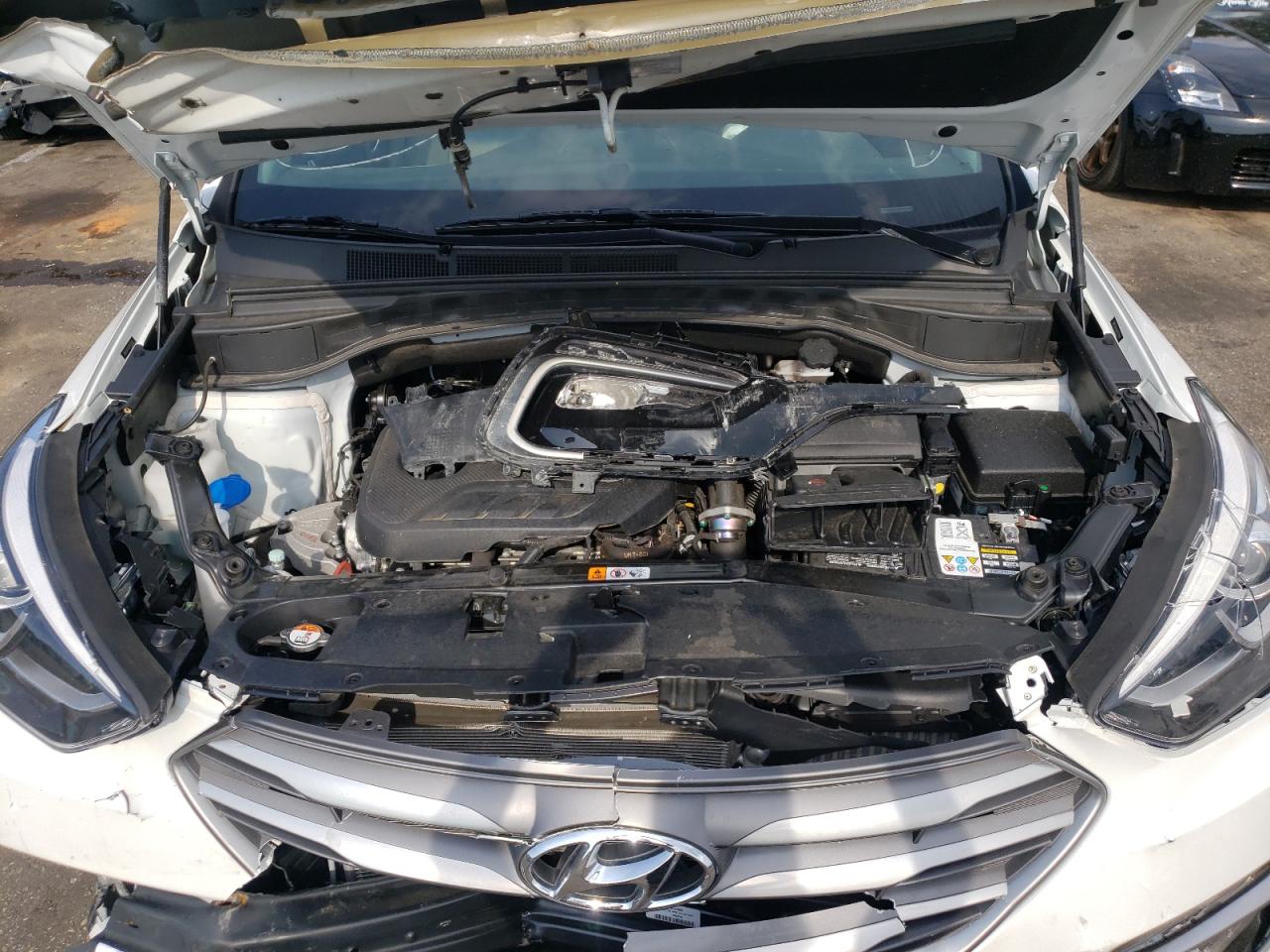 Photo 7 from auction – 2018 HYUNDAI SANTA FE S with VIN 5NMZU4LA0JH073958