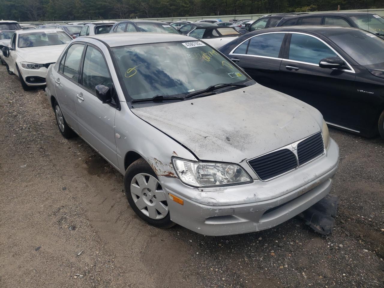 MITSUBISHI LANCER 2002 with VIN JA3AJ26E32U067749 - Photo from auction
