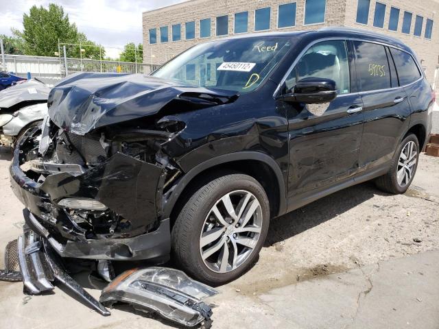 Photo 2 from auction – 2018 HONDA PILOT ELIT with VIN 5FNYF6H04JB046913