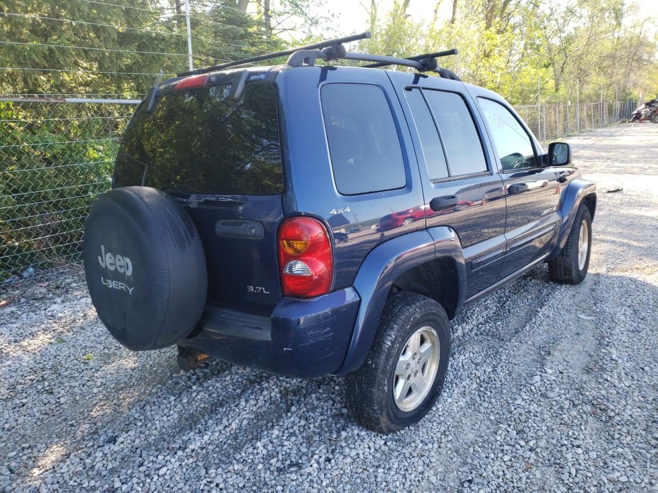 Photo 4 from auction – 2002 JEEP LIBERTY LI with VIN 1J8GL58K02W254602