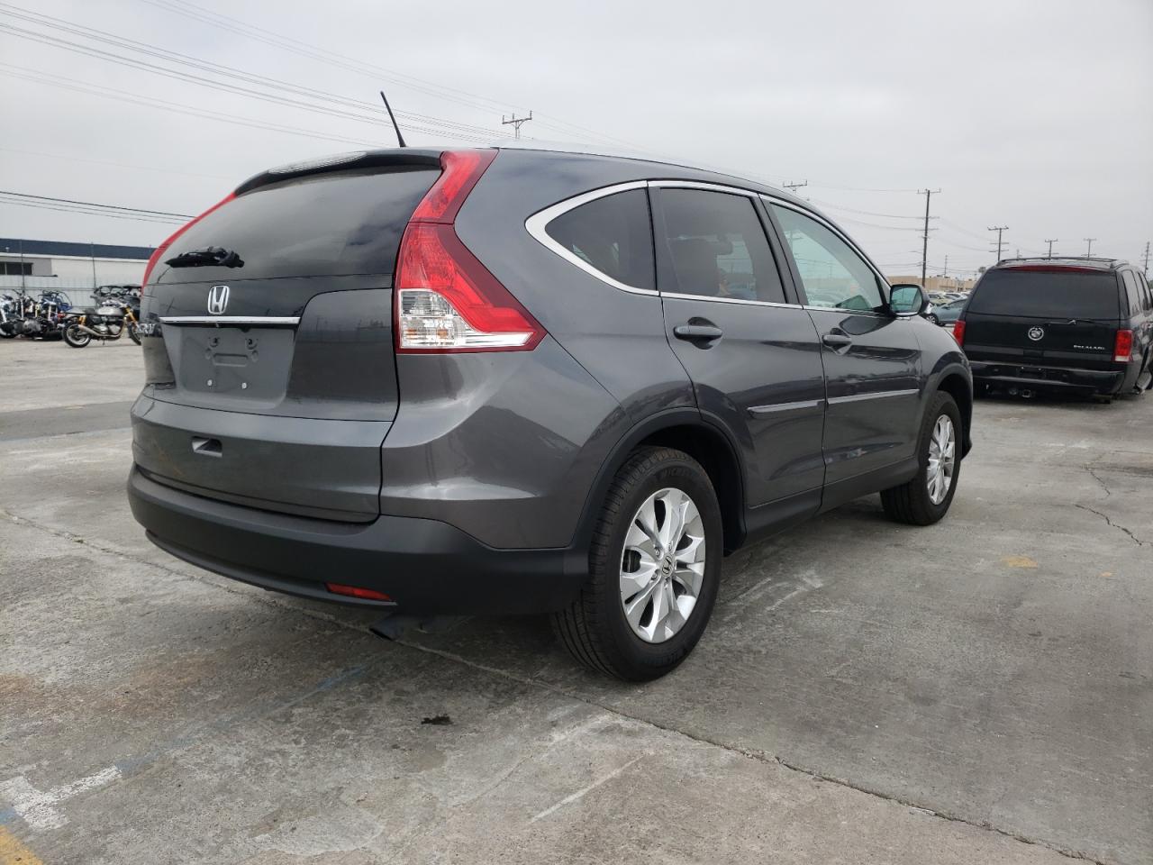 Photo 4 from auction – 2014 HONDA CR-V EXL with VIN 2HKRM3H77EH540437