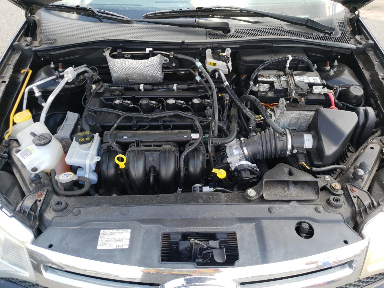 Photo 7 from auction – 2011 FORD FOCUS SE with VIN 1FAHP3FN9BW157115