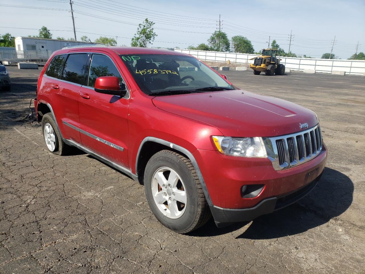 JEEP GRAND CHER 2011 with VIN 1J4RR4GG3BC561814 - Photo from auction
