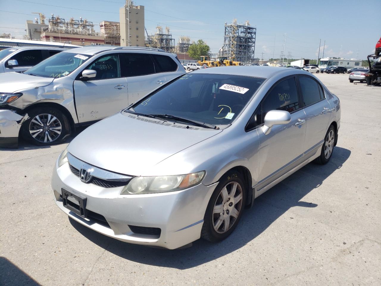 Photo 12 from auction – 2010 HONDA CIVIC LX with VIN 19XFA1F52AE021568