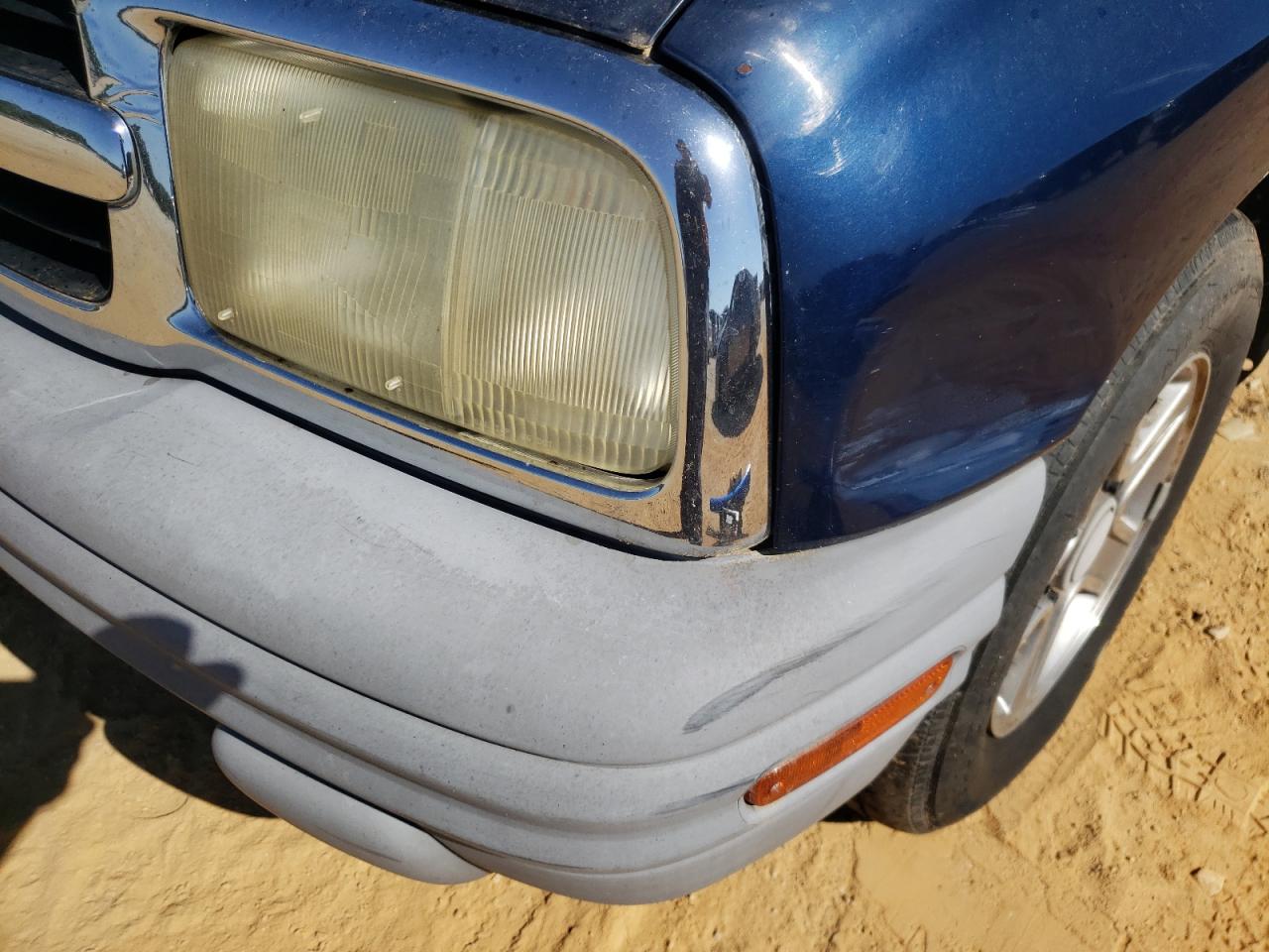 Photo 9 from auction – 2003 CHEVROLET TRACKER with VIN 2CNBE13C236921942