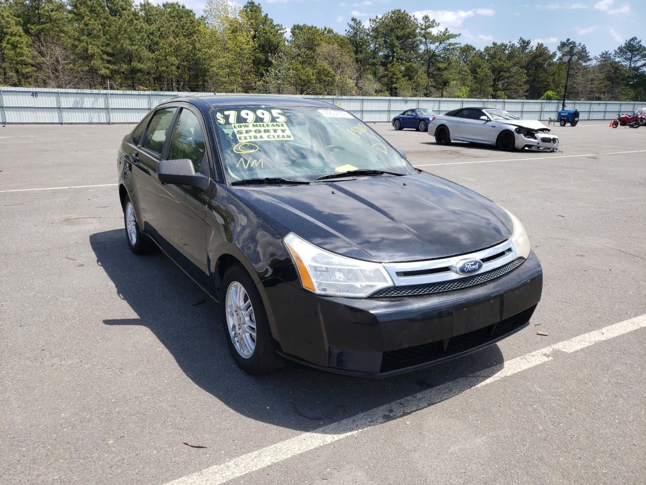 FORD FOCUS SE 2011 with VIN 1FAHP3FN9BW157115 - Photo from auction