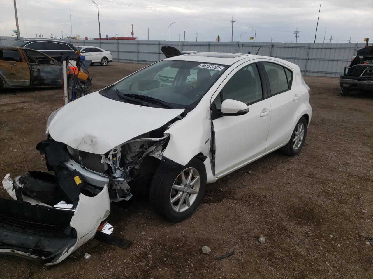 Photo 2 from auction – 2012 TOYOTA PRIUS C with VIN JTDKDTB31C1018902