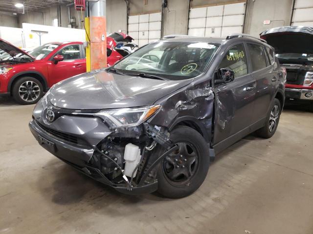 Photo 2 from auction – 2017 TOYOTA RAV4 LE with VIN JTMBFREV2HJ709762