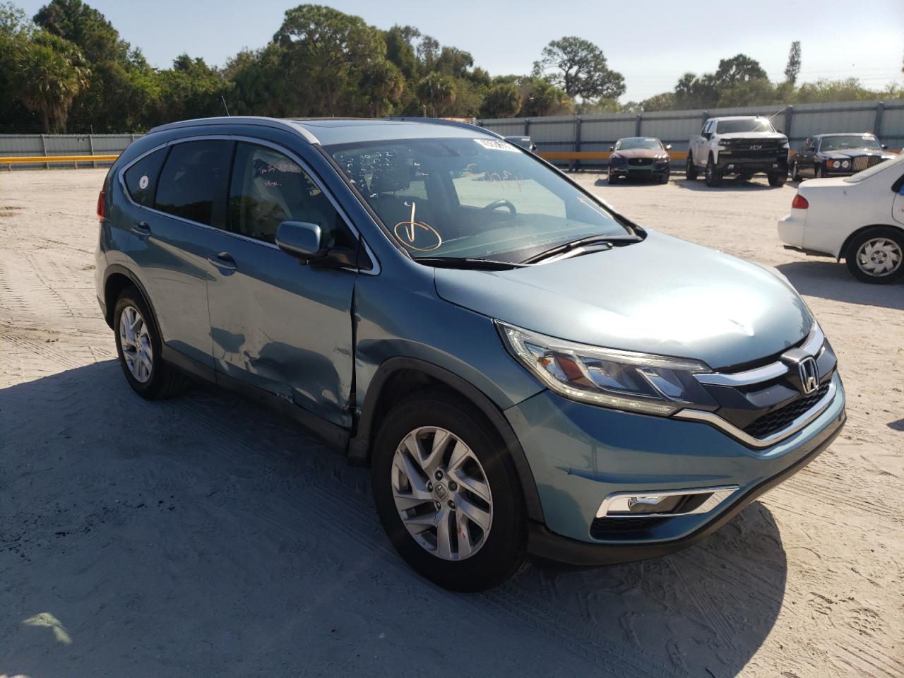 Photo 18 from auction – 2016 HONDA CR-V EXL with VIN 2HKRM4H79GH667621