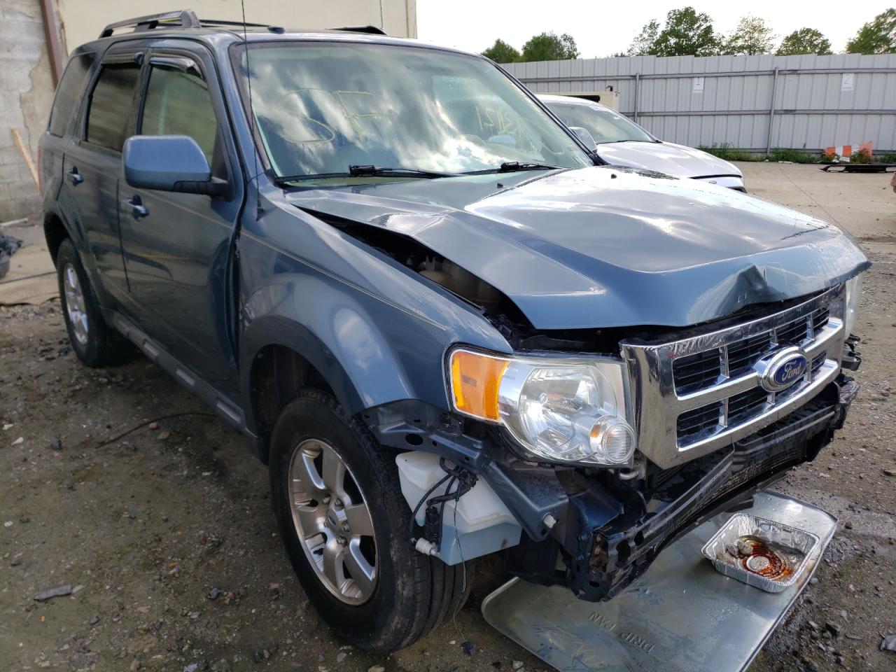 FORD ESCAPE LIM 2011 with VIN 1FMCU9EG0BKB35770 - Photo from auction