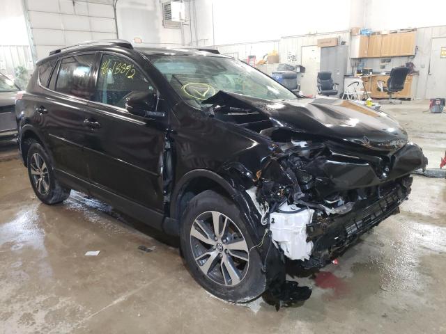 Photo 1 from auction – 2017 TOYOTA RAV4 XLE with VIN 2T3WFREVXHW360353