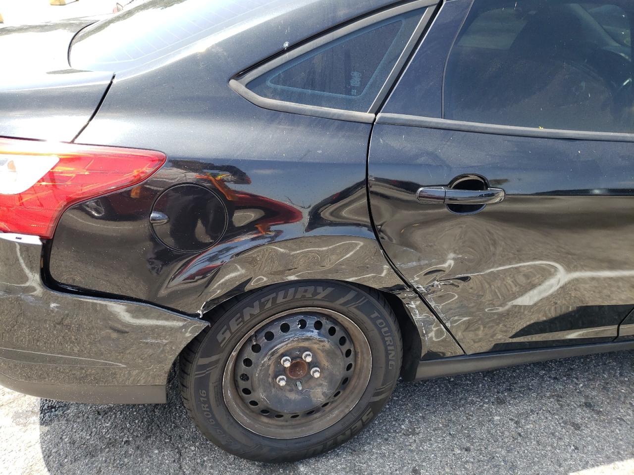 Photo 9 from auction – 2012 FORD FOCUS SE with VIN 1FAHP3F22CL115085