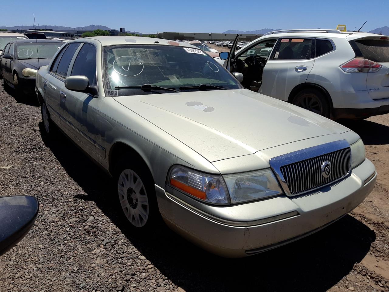MERCURY GRAND MARQ 2005 with VIN 2MEFM74W15X668418 - Photo from auction