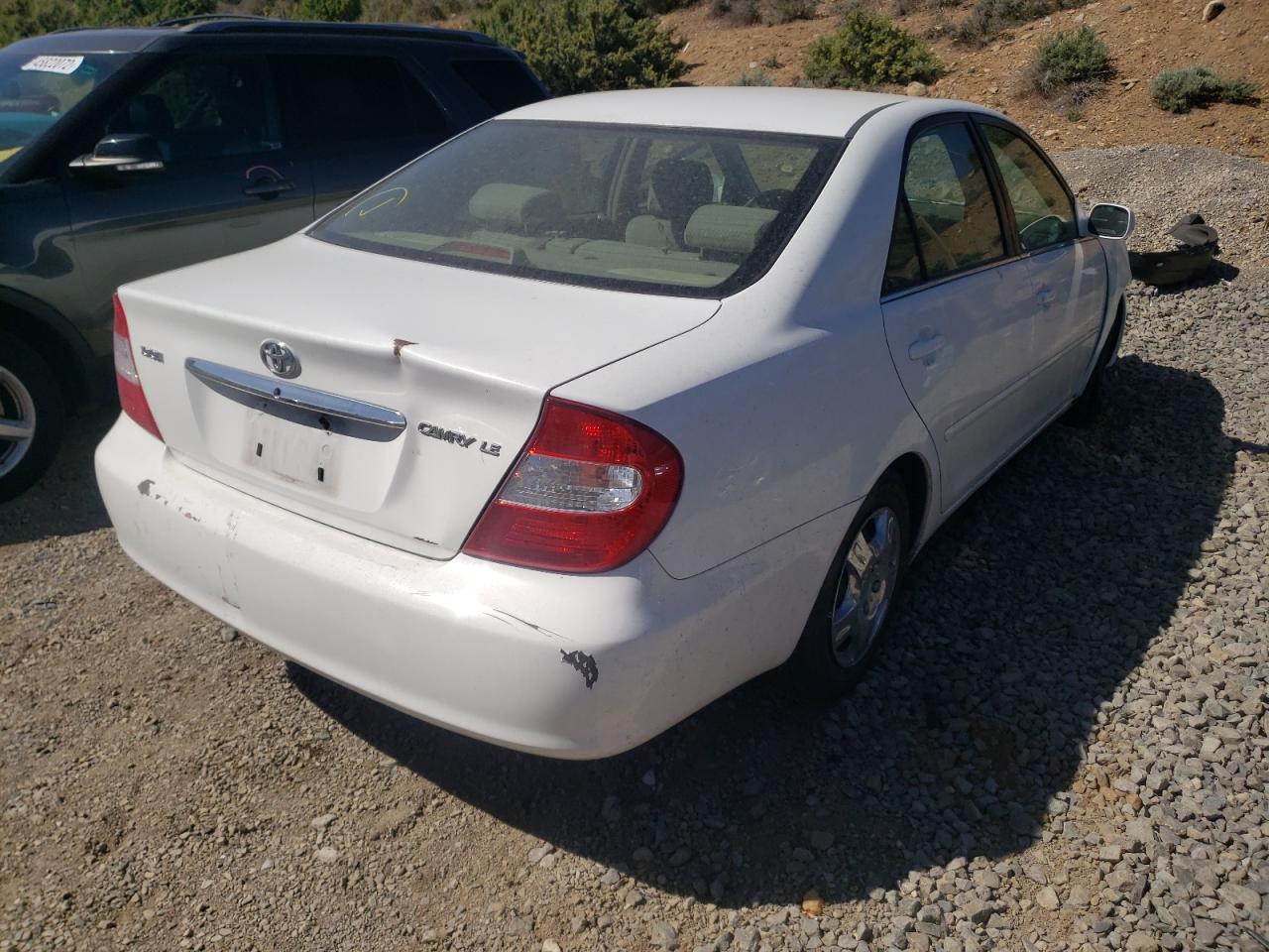 Photo 16 from auction – 2002 TOYOTA CAMRY LE with VIN JTDBE32K820121274