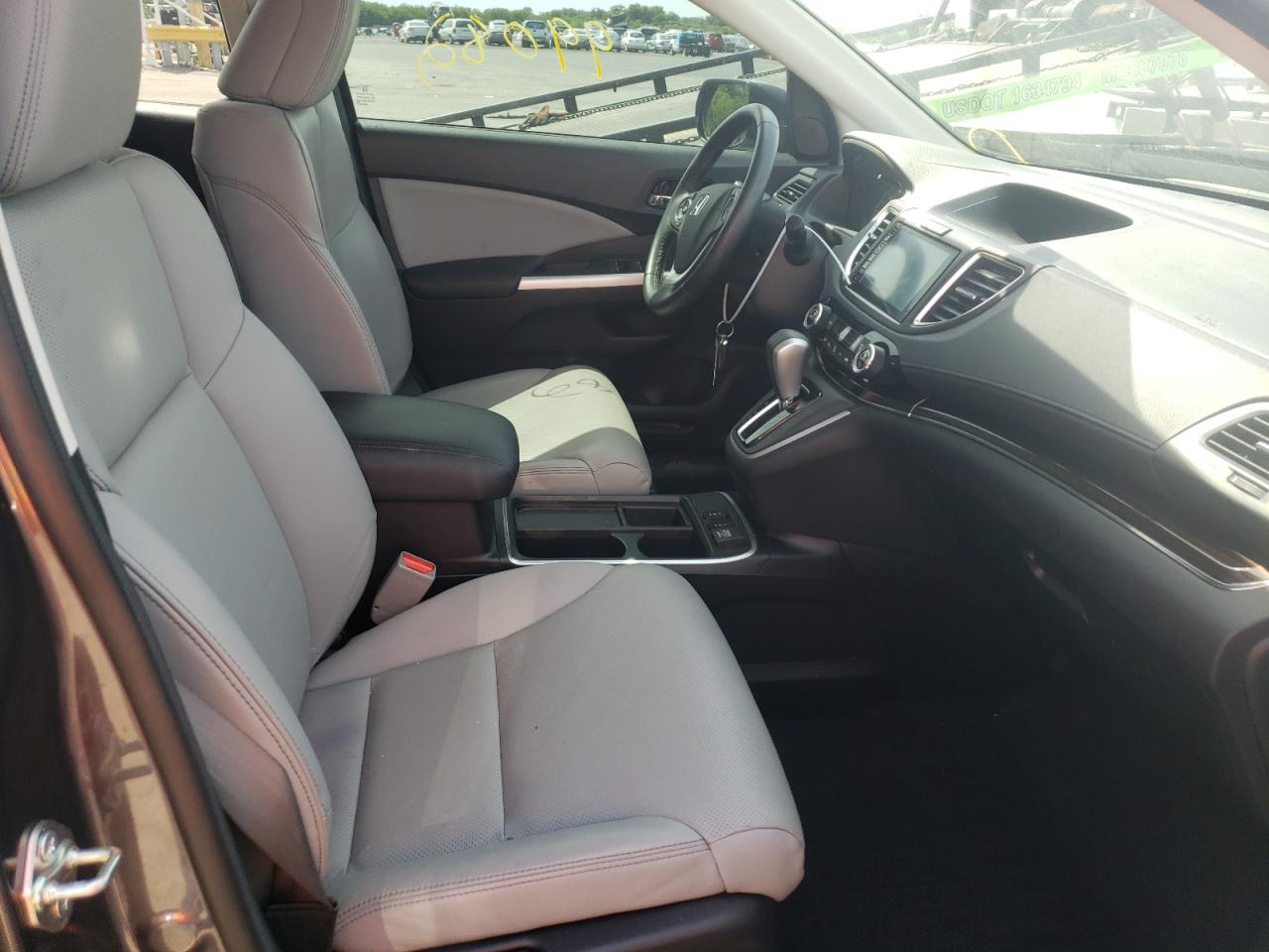 Photo 19 from auction – 2016 HONDA CR-V EXL with VIN 2HKRM3H79GH568047