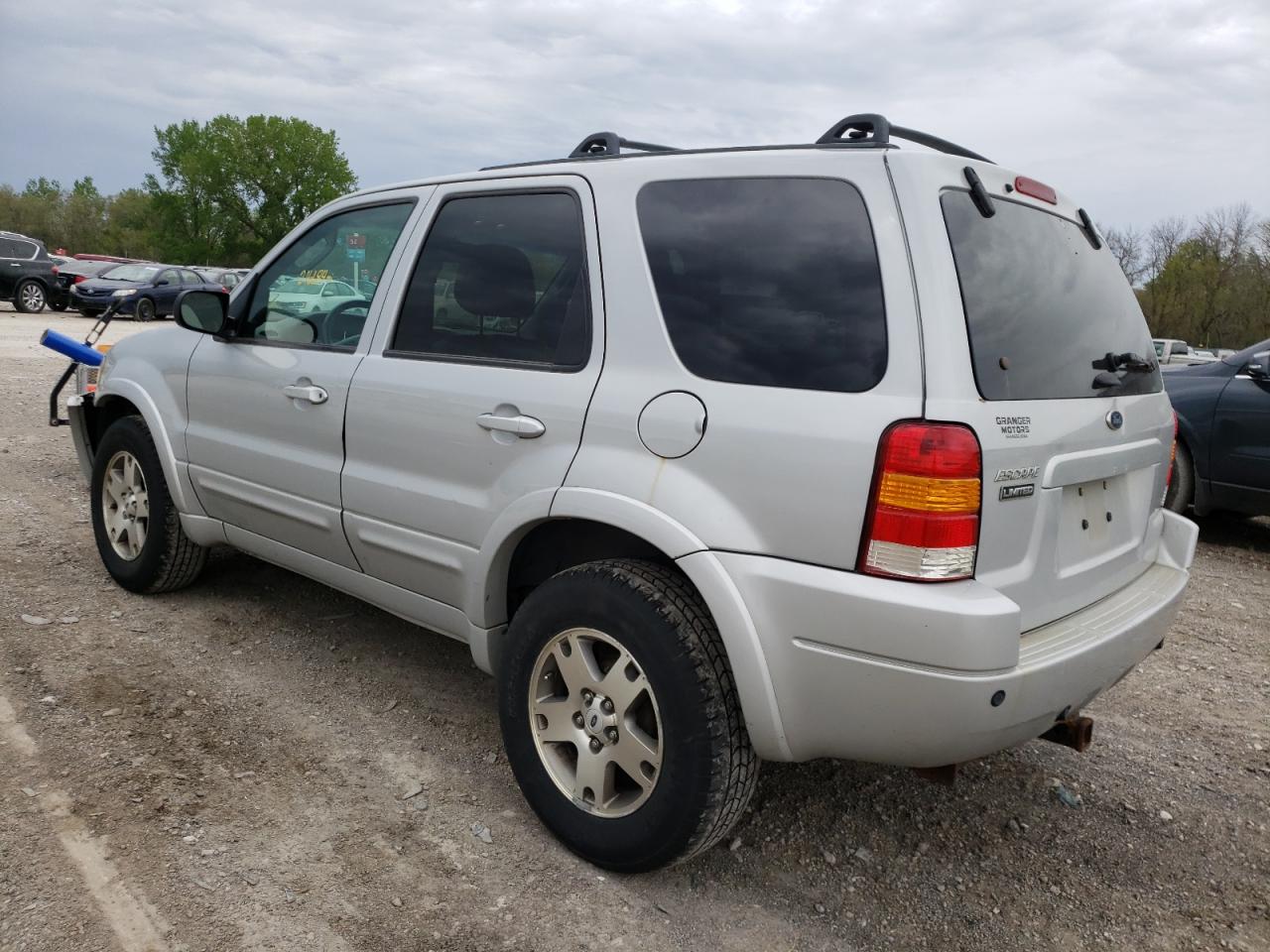 Photo 3 from auction – 2004 FORD ESCAPE LIM with VIN 1FMCU94104KA20179
