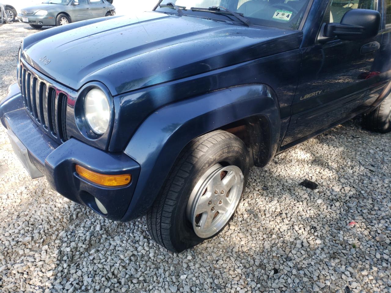Photo 9 from auction – 2002 JEEP LIBERTY LI with VIN 1J8GL58K02W254602